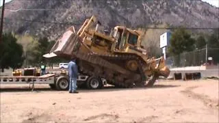 CAT D-8 Loading onto a Murray 16 Tire