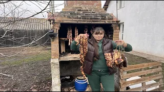 Village Life in Transylvania: Smoking Sausages and Cooking Meat on a Metal Disk!