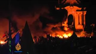 Ukraine protest camp ablaze as police move in