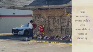 Fans leave memorials at scene of rapper Young Dolph's shooting