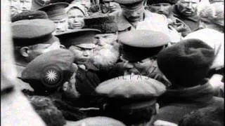 Bolshevik leader Vladimir Lenin addresses a crowd and other leaders stand by him,...HD Stock Footage