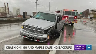 Multiple vehicle crash blocking all lanes on westbound I-90 at Maple