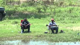 People Fishing in Mississippi River in New Orleans