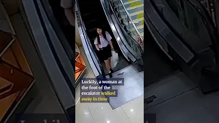 Shopping cart tumbles down escalator after man let go #shorts