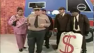 EL ESPECIAL DEL HUMOR 03 EL NEGRO MAMA TIA PORTOLA Y EL ASALTO AL CAMION HERPES 200310.mpg.flv