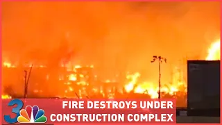 Massive fire tears through under-construction apartment