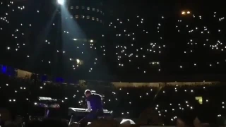 Chris Martin discovers a spider on his piano during Everglow (Milan July, 3)