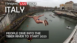 LIVE: Italians dive into the icy waters of the Tiber River to start 2023
