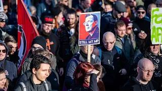 Rallies in east Germany after ruling party votes with far-right party