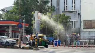 India's Ahmedabad deploys water sprinklers to cool motorists sweltering under heatwave