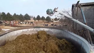 Mixing Feed With a TMR Feed Mixer on a Wisconsin Dairy Farm