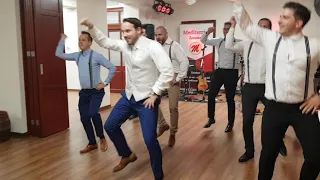 Surprise wedding groomsmen dance!