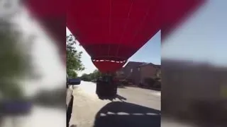 Man sees hot air balloon come down