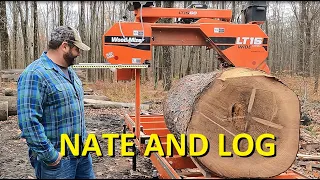 Nate plays with the woodmizer sawmill. Sawing Spruce Stickers.