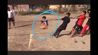 funny kid...tug of war