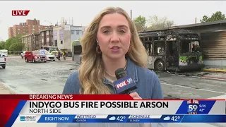 A redline bus catches fire, after reports of a suspect dumping a water bottle full of gasoline