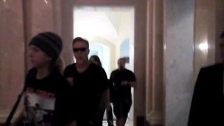 James Hetfield passing by fans in hotel; Hetfield, his family, Ulrich, Trujillo leaving hotel SPb