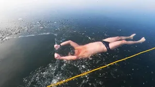 Man Swims Under Frozen Lake