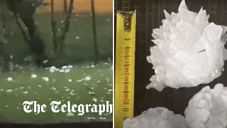 Hailstones the size of tennis balls rain down on Italy and Spain amid extreme weather