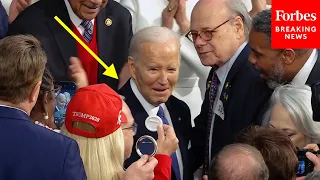 Marjorie Taylor Greene Holds Pin In Front Of Biden As He Enters House Chamber For State Of The Union