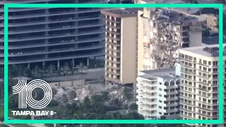Aerials: Debris hangs off collapsed Miami-area condo