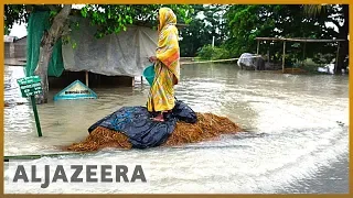 India's monsoon floods kill dozens, displace thousands