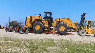Loading up a brand new CAT 988K at the factory (extended version)