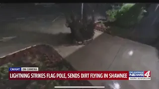 Lightning strikes flag pole, sends dirt flying in shawnee