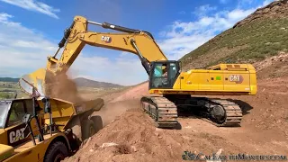 CAT 395 ME Excavator Loading 40 Ton Artics