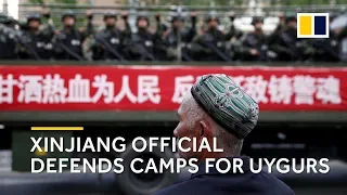 Xinjiang official defends camps for Uygurs