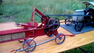 Model steel wheel tractor and hay press