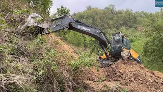 Excavator Cutting Gravelly Hillside