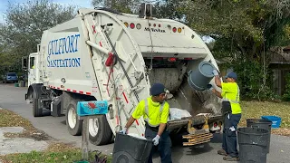 Gulfport Sanitation McNeilus Rear Loader Garbage Truck vs Manual Trash