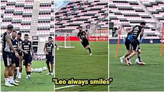 Lionel Messi looks happy during his first training with the Argentina national team in Beijing