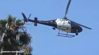 LAPD AIR SUPPORT CIRCLING/ HOVERING/ FLY BY