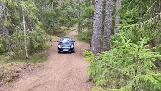 Opel insignia diesel a20dth 4x4 off road in forest with sandy road.