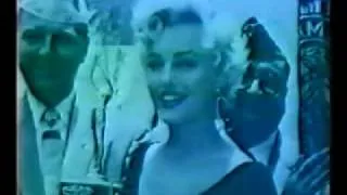 Marilyn Monroe receives award from the American Legion 1954