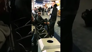 Kamaru Usman confronts Colby Covington at the airport