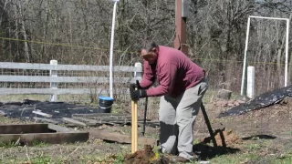 How to dig post holes by hand using a manual post hole digger