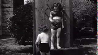 Mom throwing knives at her kids (age 5, age 2.5)| very skilled| 1950