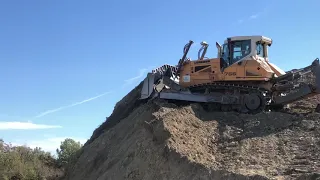 Liebherr 756 bulldozer in action on a hill