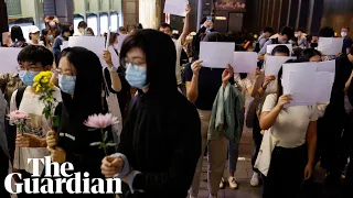 Hong Kong residents show support for mainland China Covid protests