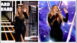 Mariah Carey talks backstage at the 2019 Billboard Music Awards after performance