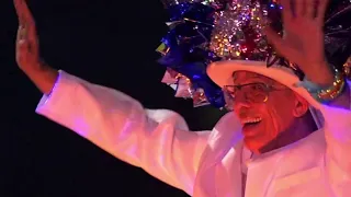 Mr. Fiesta Michael Quintanilla makes his way down the Fiesta Flambeau Parade as the grand marshal