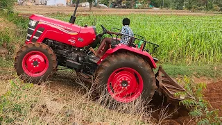 Mahindra yovo tech Plus 585 goes to 9piont spring cultivater pulling performance in farmland 4wd