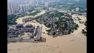 China flood!!! Chinese flooding!!Thousands evacuated as floods threaten a massive dam