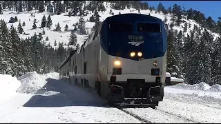 AMTRAK 'California Zephyr' in winter wonderland near Donner Pass in Sierra Nevada mountains