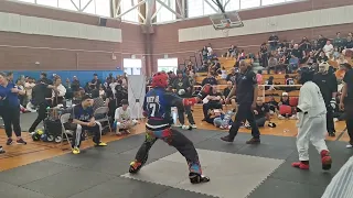 Second karate match. Blue belt vs red belt