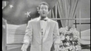 Domenico Modugno sings "Nel Blu Dipinto Di Blu"