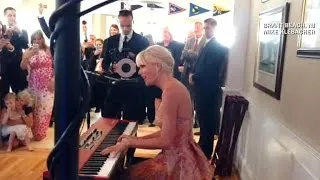Taylor Swift crashes couple's wedding, sings "Blank Space"